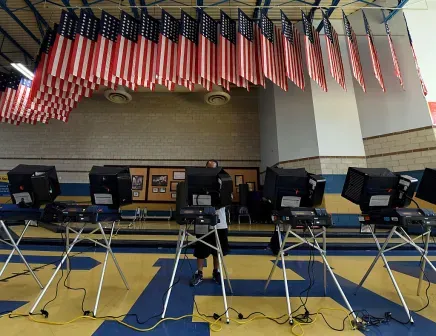 Voting machine manufacturers pushed for cybersecurity information by Sen. Wyden